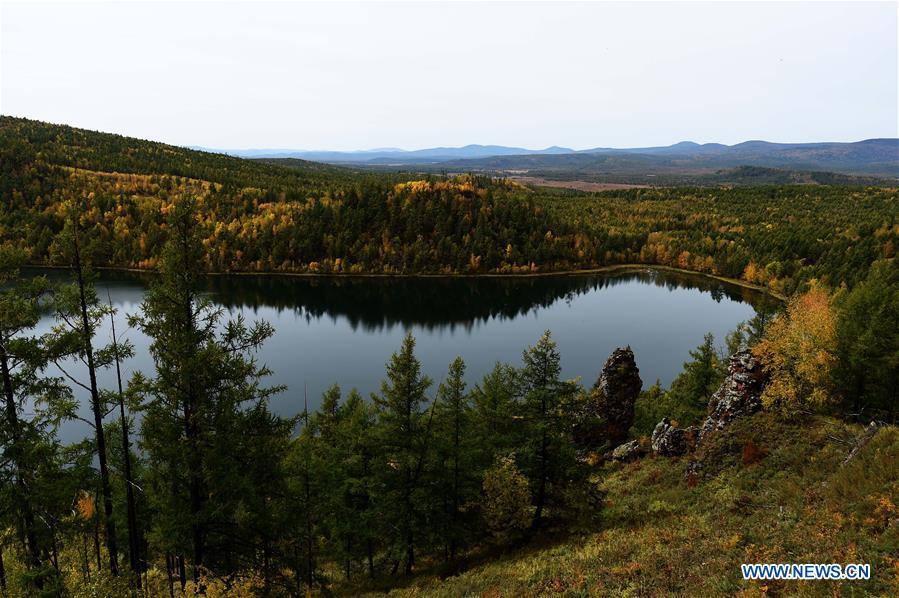 <?php echo strip_tags(addslashes(Photo taken on Sept. 14, 2018 shows autumn scenery of the Tianchi Lake in Arxan, north China's Inner Mongolia Autonomous Region. (Xinhua/Ren Junchuan))) ?>