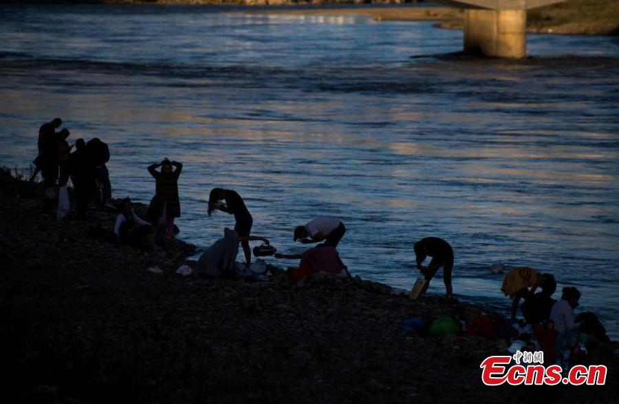 People celebrate the Karma Dunba (The Bathing Festival) in the Lhasa River in Lhasa City, Southwest China’s Tibet Autonomous Region, Sept. 15, 2018. Legend has it bathing during the period is beneficial to health. (Photo: China News Service/He Penglei)