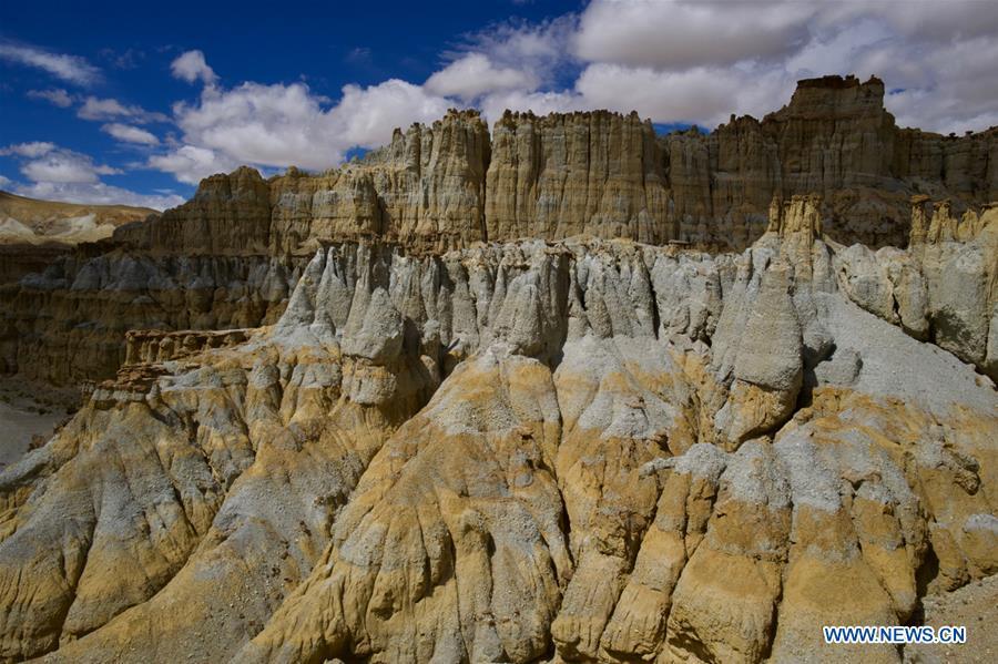 Photo taken on Sept. 11, 2018 shows the scenery of Xiayigou Earth Forest in Zanda County of Ali, southwest China\'s Tibet Autonomous Region. Settled along the Xiangquan River in the county, the well-preserved Earth Forest appears colorful especially under direct sunlight due to the ore contained. (Xinhua/Purbu Zhaxi)