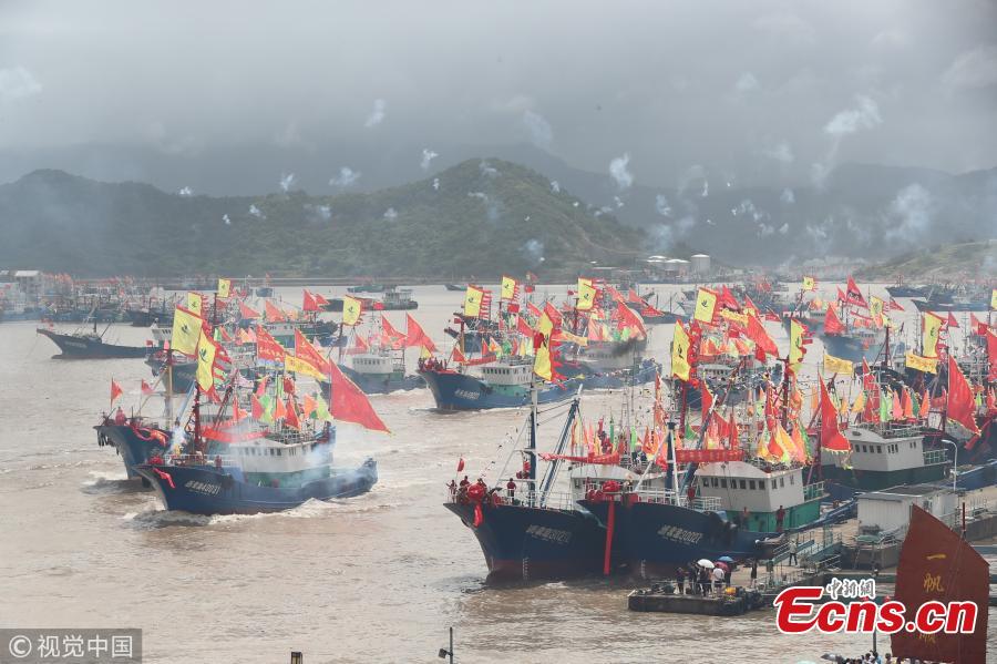 Fishing boats sail in the sea area of Ningbo, East China\'s Zhejiang Province, Sept. 16, 2018. A fishing ban, imposed on the Yellow Sea and the East China Sea from May 1 to Sept. 16, was lifted on Sunday. (Photo/VCG)