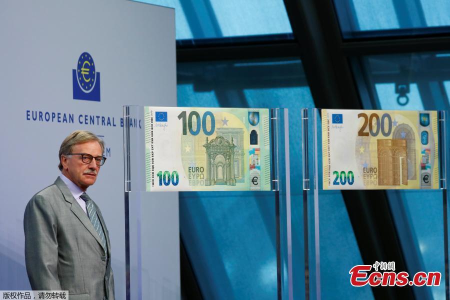 <?php echo strip_tags(addslashes(Yves Mersch, member of the Executive Board of the European Central Bank (ECB), presents the new 100- and 200-euro banknotes at the ECB headquarters in Frankfurt, Germany, September 17, 2018.(Photo/Agencies))) ?>