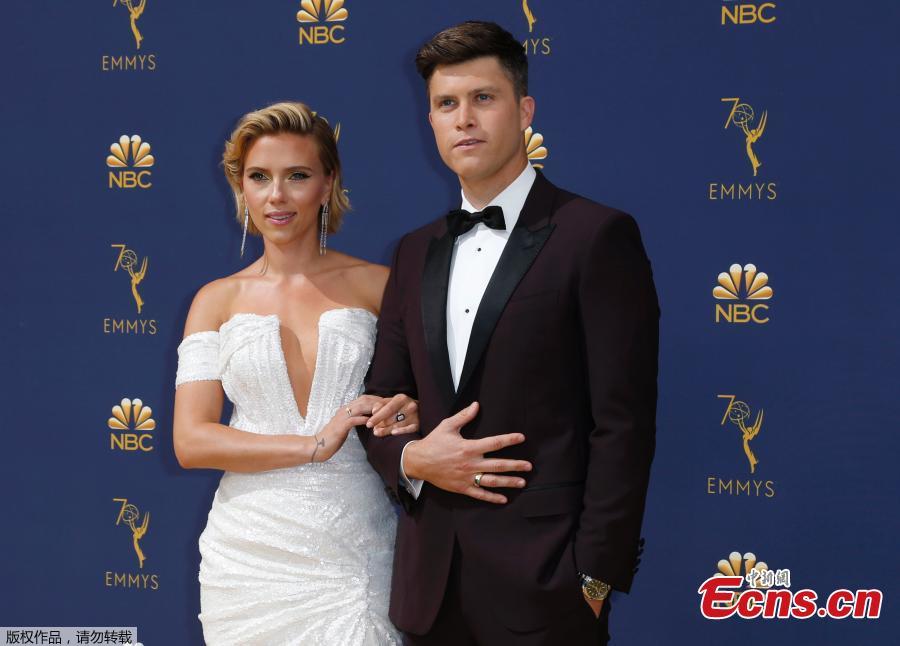 Scarlett Johansson, left, and Colin Jost arrive at the 70th Primetime Emmy Awards, Sept. 17, 2018, at the Microsoft Theater in Los Angeles. (Photo/Agencies)