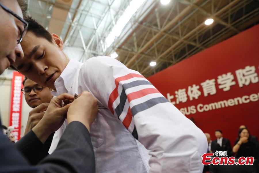 Chinese swimmer Sun Yang attend the opening ceremony of autumn semester at Shanghai University of Sport in Shanghai, Sept. 19, 2018. Triple Olympic champion Sun Yang is now back to school to take a PhD program, with a major in kinesiology. (Photo: China News Service/Yin Liqin)