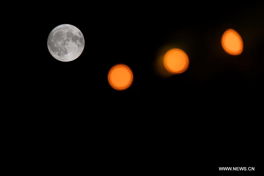 <?php echo strip_tags(addslashes(Photo taken on Sept. 24, 2018 shows the full moon at Nanhu park in Changchun, capital of northeast China's Jilin Province. The Mid-Autumn Festival, which falls on Sept. 24 this year, is a traditional Chinese festival with a custom of family reunion. (Xinhua/Zhang Nan))) ?>