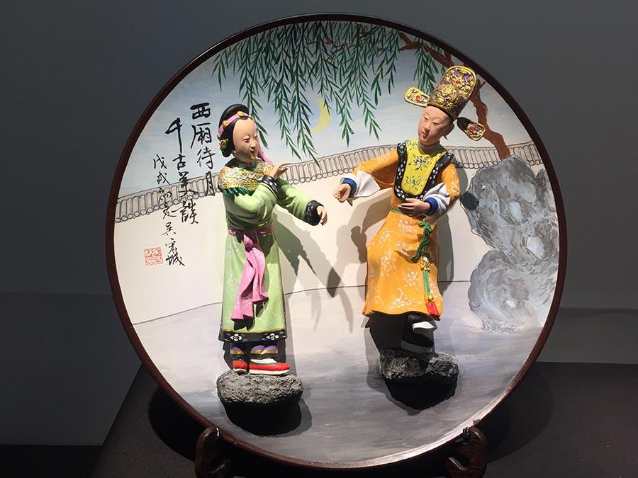 Colored sculptures are shown at the exhibition. (Photo/China Daily)