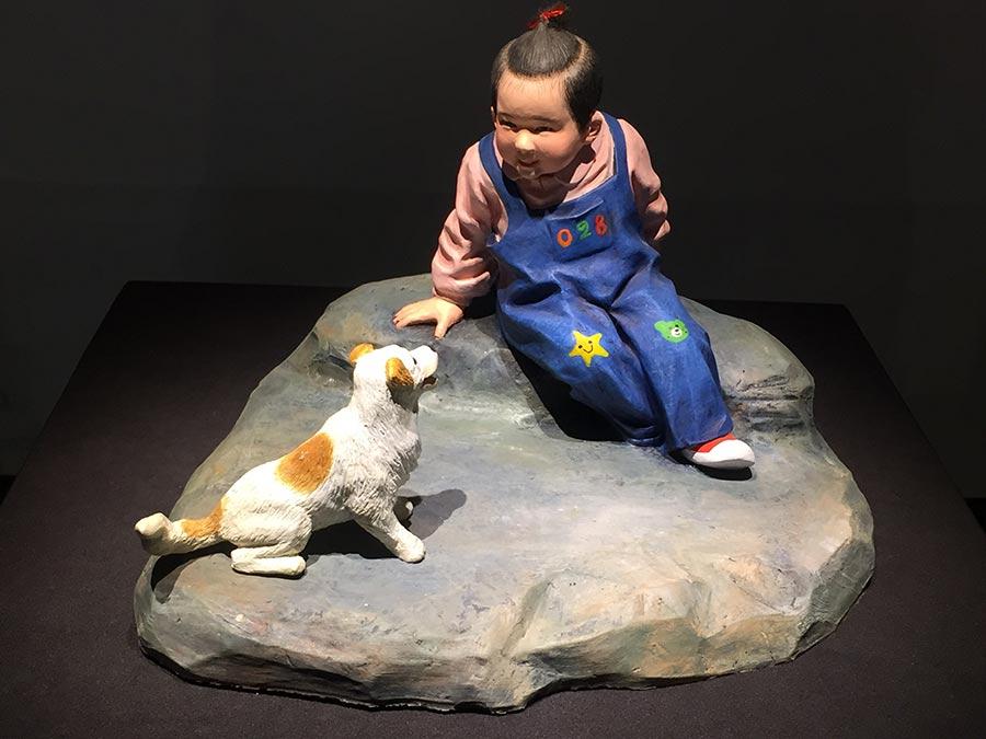 Colored sculptures are shown at the exhibition. (Photo/China Daily)