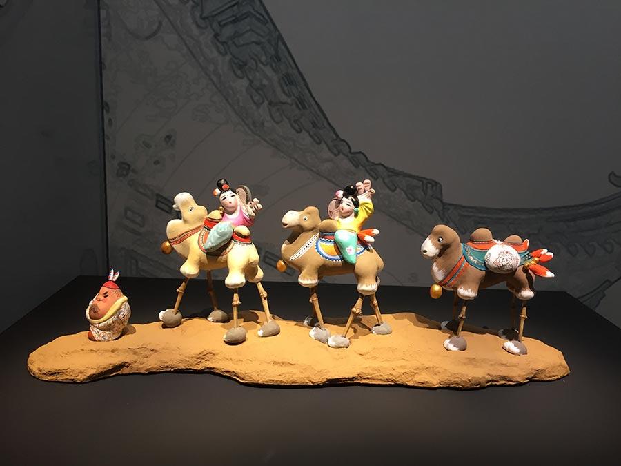 Colored sculptures are shown at the exhibition. (Photo/China Daily)