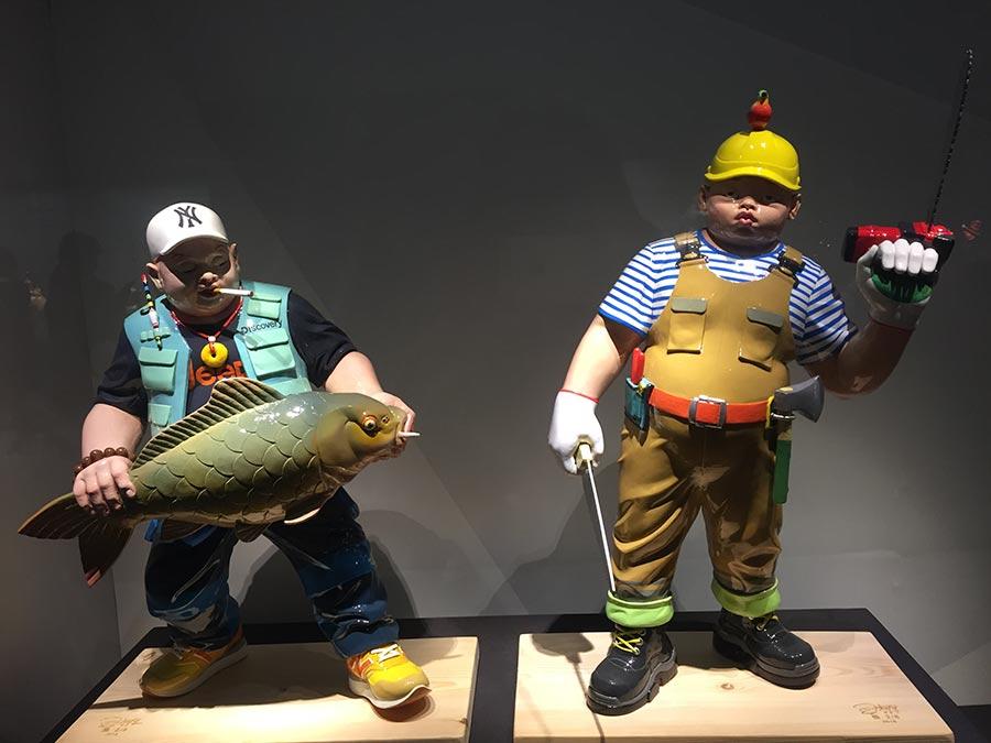 Colored sculptures are shown at the exhibition. (Photo/China Daily)