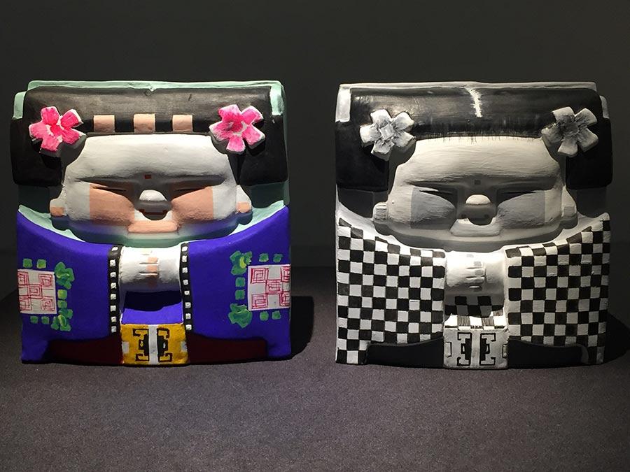 Colored sculptures are shown at the exhibition. (Photo/China Daily)