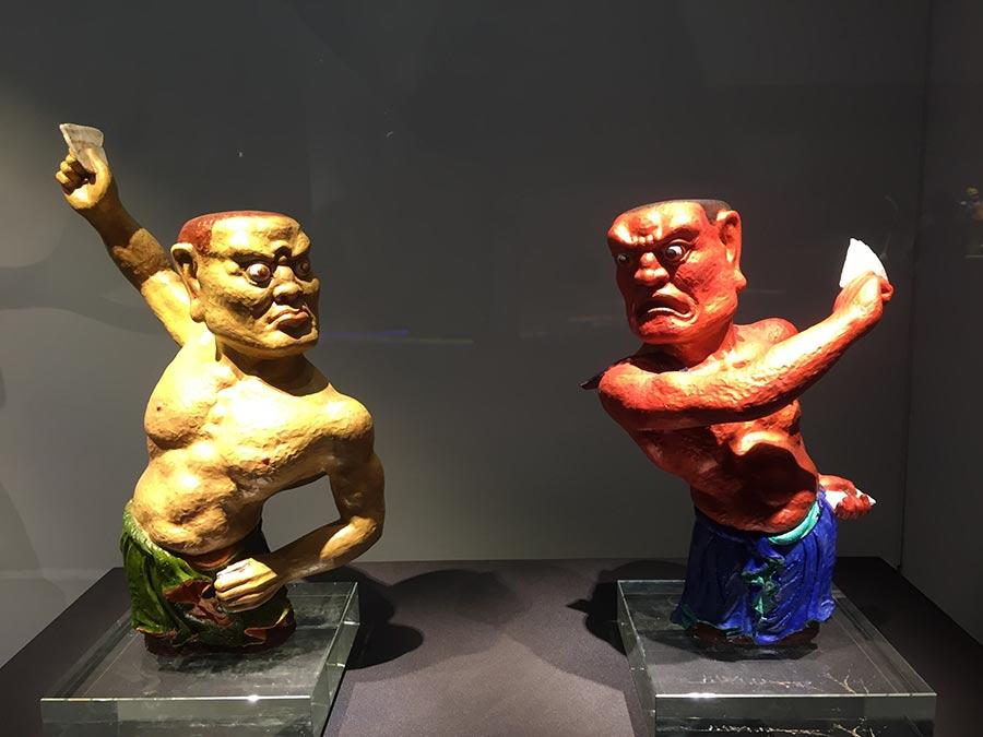 Colored sculptures are shown at the exhibition. (Photo/China Daily)