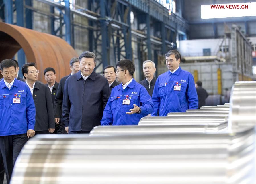 Chinese President Xi Jinping, also general secretary of the Communist Party of China (CPC) Central Committee and chairman of the Central Military Commission, visits a workshop of China First Heavy Industries (CFHI) in Qiqihar, northeast China\'s Heilongjiang Province, Sept. 26, 2018. Xi inspected Qiqihar on Wednesday. (Xinhua/Wang Ye)