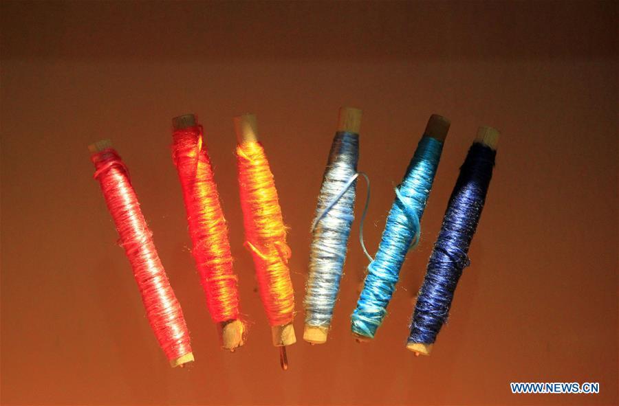 <?php echo strip_tags(addslashes(Photo taken on Sept. 26, 2018 shows colorful silk threads used for weaving Yun brocade at the Nanjing Yunjin Museum in Nanjing, capital of east China's Jiangsu Province. Yunjin, also called Yun brocade, is traditional Chinese silk brocade made in Nanjing of Jiangsu. Dated from the Eastern Jin Dynasty, it has formed its own characteristics through its development of 1,600 years. Yun brocade is famous for its exquisite craft, elegant patterns and smooth texture, and the making of the artwork requires close cooperation of two weavers, who can produce only five centimeters a day. In 2009, Yun brocade was inscribed on the Representative List of the Intangible Cultural Heritage of Humanity. (Xinhua/Sui Xiankai))) ?>