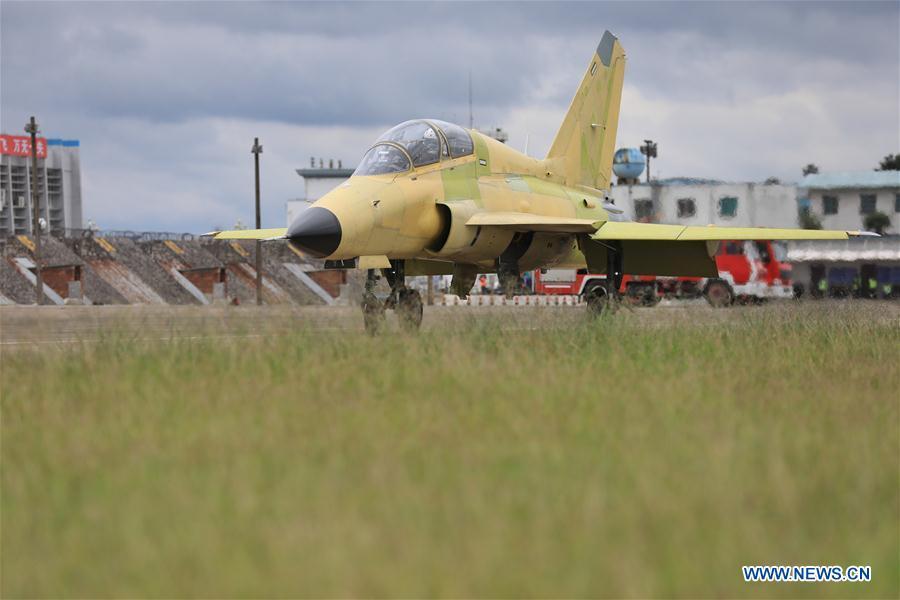 Photo taken on Sept. 28, 2018 shows the FTC-2000G aircraft taxiing on the runway in Anshun, southwest China\'s Guizhou Province. China\'s self-developed FTC-2000G versatile aircraft successfully conducted its maiden flight Friday in the city of Anshun, according to its developer. (Xinhua/Ou Dongqu)