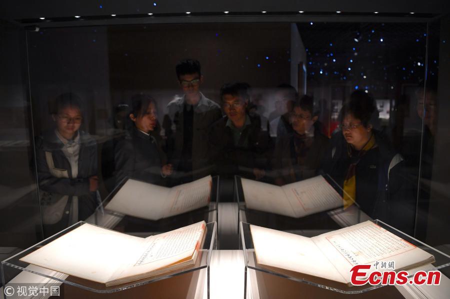 An exhibition of Yongle Dadian, among the world\'s largest old encyclopedias, opens at the National Library of China in Beijing, Sept. 28, 2018. The display shows pages from the encyclopedia, which dates back to the Ming Dynasty (1368-1644), when it was compiled during the reign of Emperor Yongle. (Photo/VCG)