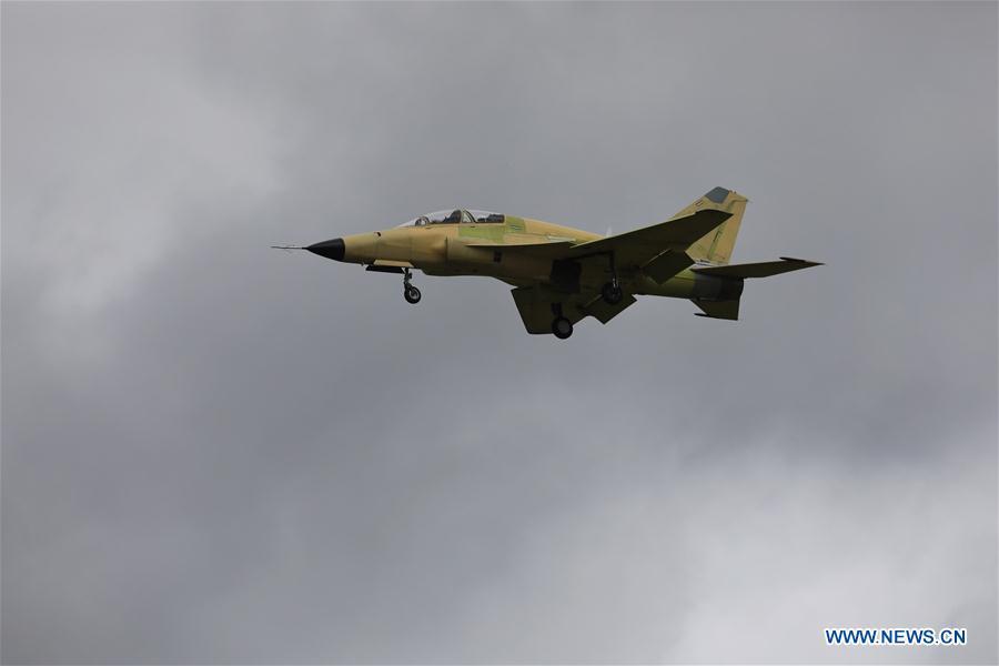 Photo taken on Sept. 28, 2018 shows the FTC-2000G aircraft flying in Anshun, southwest China\'s Guizhou Province. China\'s self-developed FTC-2000G versatile aircraft successfully conducted its maiden flight Friday in the city of Anshun, according to its developer. (Xinhua/Ou Dongqu)