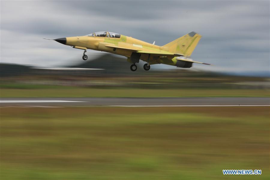 Photo taken on Sept. 28, 2018 shows the FTC-2000G aircraft taking off in Anshun, southwest China\'s Guizhou Province. China\'s self-developed FTC-2000G versatile aircraft successfully conducted its maiden flight Friday in the city of Anshun, according to its developer. (Xinhua/Ou Dongqu)