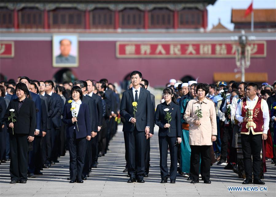 <?php echo strip_tags(addslashes(A ceremony to pay tribute and lay floral baskets to the Monument to the People's Heroes is held at Tian'anmen Square in Beijing, capital of China, Sept. 30, 2018, on the occasion of the Martyrs' Day. (Xinhua/Shen Hong))) ?>