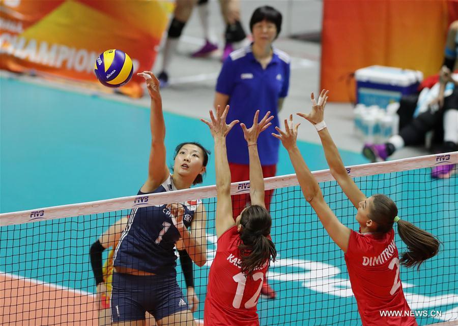 <?php echo strip_tags(addslashes(Yuan Xinyue (L) of China spikes the ball during the Pool B match against Bulgaria at the 2018 Volleyball Women's World Championship in Sapporo, Japan, Oct. 3, 2018. China won 3-1. (Xinhua/Du Xiaoyi))) ?>