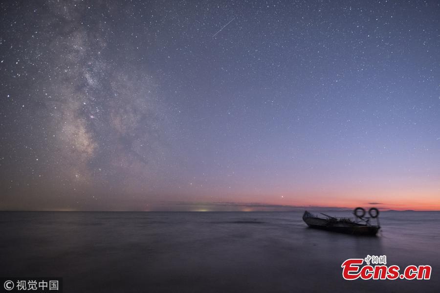 <?php echo strip_tags(addslashes(A photo taken on Oct. 3 and 4, 2018 shows the stars in the Milk Way over Xingkai Lake on the border between China and Russia, in Jixi City, Northeast China’s Heilongjiang Province. The lake is known as a great place to observe the stars at night. (Photo/VCG))) ?>