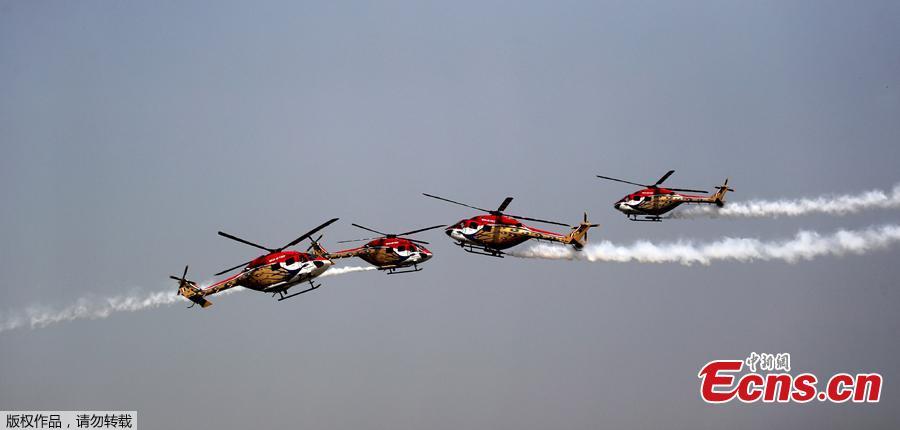 <?php echo strip_tags(addslashes(Advanced Light Helicopters (ALH) from the Indian Air Force's Sarang aerobatics team perform during the Air Force Day parade at the Air Force station Hindon in Ghaziabad town on the outskirts of New Delhi on October 8, 2018. The Indian Air Force celebrated its 86th anniversary on October 8, 2018.  (Photo/Agencies))) ?>