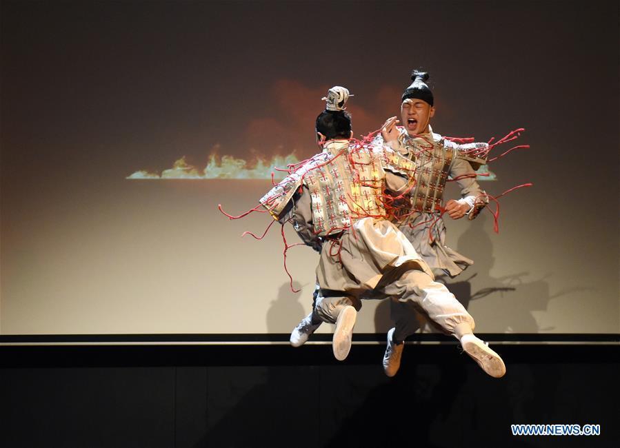 <?php echo strip_tags(addslashes(Members of the art troupe of the Beijing-based Capital University of Physical Education and Sports perform in Bogazici University of Istanbul, Turkey, on Oct. 9, 2018. A charm of Chinese Kung Fu tour started on Tuesday evening at Bogazici University in Istanbul, enchanting the audience with a mixture of Chinese martial arts and dances. (Xinhua/He Canling))) ?>