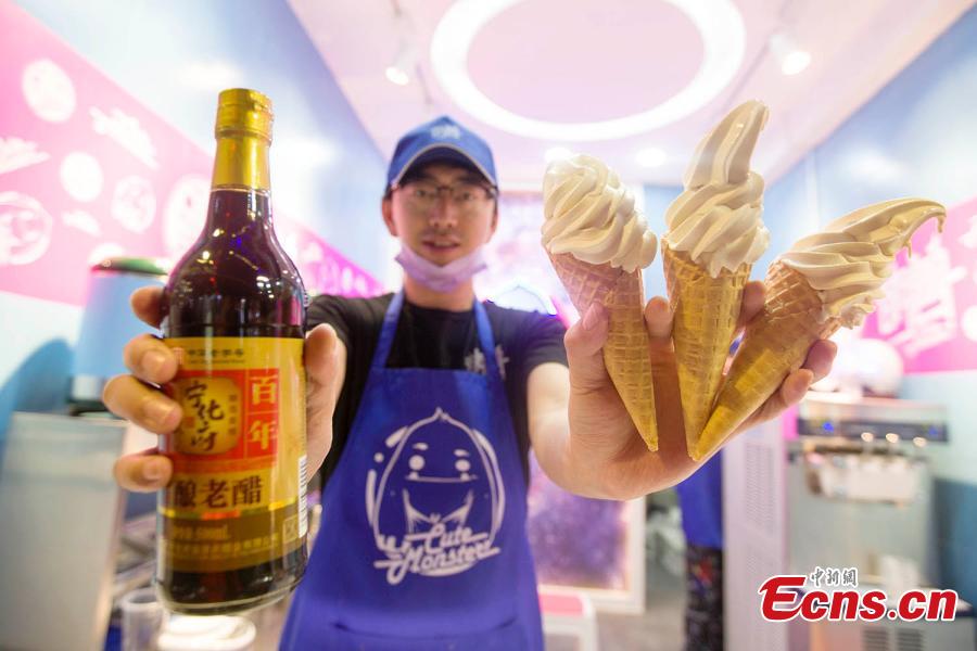 <?php echo strip_tags(addslashes(A man shows ice cream flavored with mature vinegar in Taiyuan, capital of north China's Shanxi Province, October 9, 2018. (Photo: China News Service/ Zhang Yun))) ?>