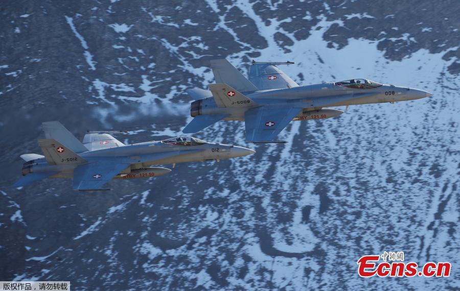 <?php echo strip_tags(addslashes(Swiss Air Force F/A 18 Hornet fighter jets perform during a flight demonstration of the Swiss Air Force over the Axalp in the Bernese Oberland, Switzerland, Oct. 10, 2018. (Photo/Agencies))) ?>