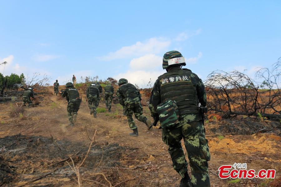 Some 200 Chinese armed police officers receive training in Fangchenggang City, South China’s Guangxi Zhuang Autonomous Region. The week-long training includes demanding search and rescue operations in mountain and forest settings, and rapid response to infection outbreak scenarios. (Photo: China News Service/Cui Cheng)