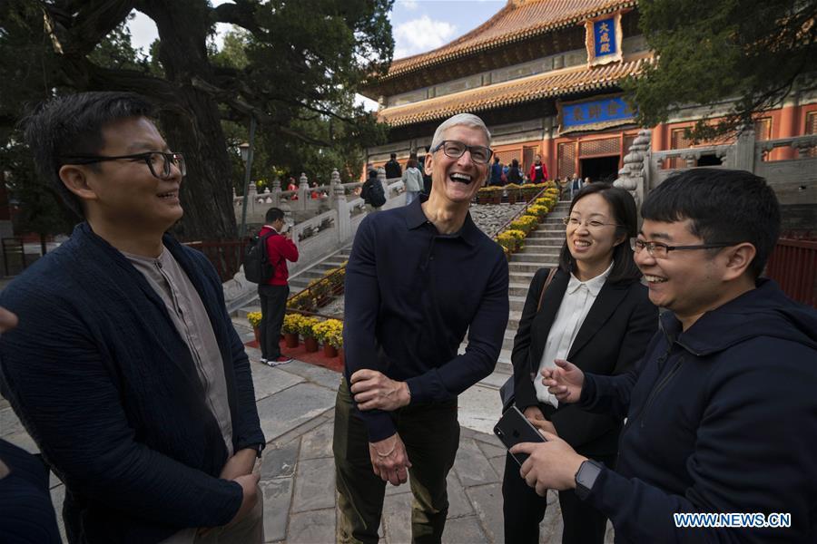 <?php echo strip_tags(addslashes(Apple's CEO Tim Cook (2nd, L) talks with Qu Zhangcai (1st L) and Liu Zhipeng (1st R), founders of Xichuangzhu APP, at Beijing Confucian Temple in Beijing, capital of China, on Oct. 10, 2018. Cook paid a visit to Beijing Confucian Temple and the Imperial College on Wednesday. (Xinhua/Cai Yang))) ?>