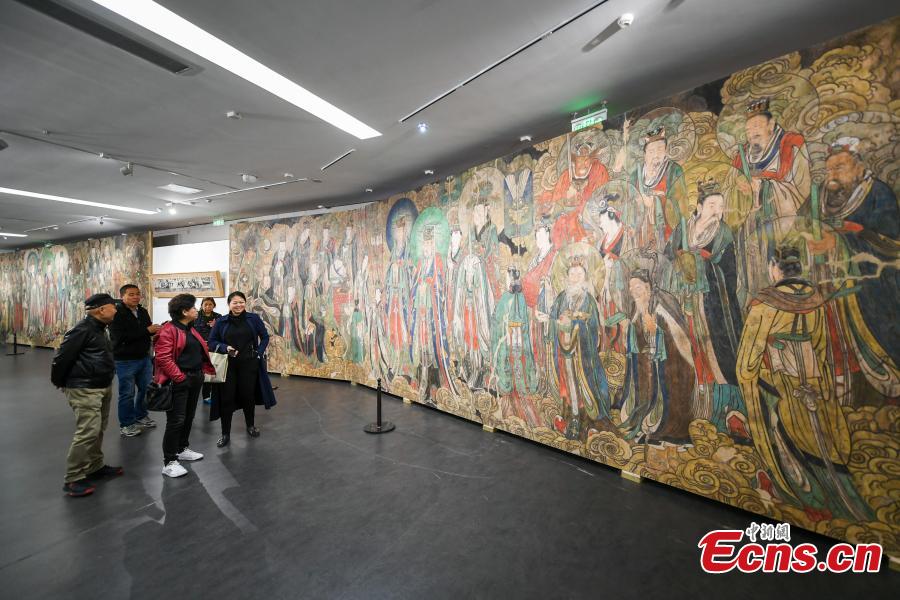 <?php echo strip_tags(addslashes(Visitors look at a replica of Chao Yuan Tu (Pictures of Paying Homage to the Origin), the famous wall murals that depict the story of Taoism in Yongle Temple, at the Taiyuan Art Museum in Taiyuan City, North China’s Shanxi Province, Oct. 11, 2018. The life-size replica was created using high-tech means. The museum is exhibiting 80 replicas of ancient original murals from China but now collected in other countries. (Photo: China News Service/Wu Junjie))) ?>