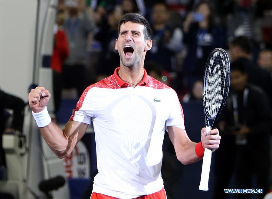 Novak Djokovic of Serbia celebrates after winning the men\'s singles final match against Borna Coric of Croatia at 2018 ATP Shanghai Masters tennis tournament in Shanghai, east China, Oct. 14, 2018. Novak Djokovic won 2-0 in the final and claimed the title of the event. (Xinhua/Fan Jun)