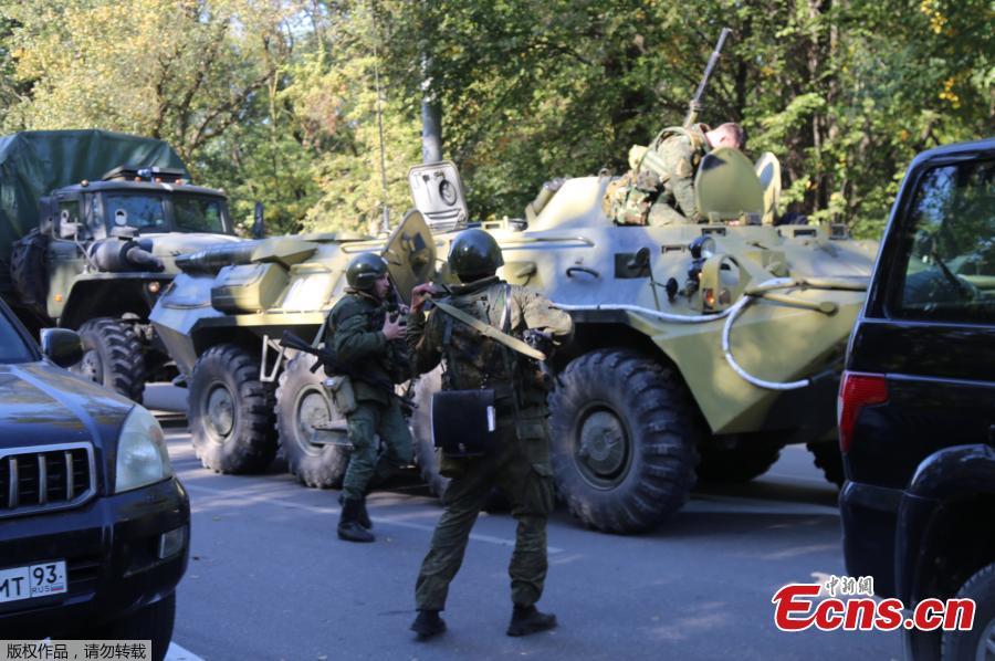 <?php echo strip_tags(addslashes(Military forces block the road to the site of attack at a vocational school in Kerch in Crimea, Oct.17, 2018. At least 19 people have been killed and dozens injured in a mass shooting at the college. (Photo/Agencies))) ?>