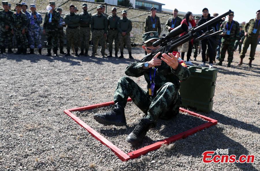 An international sniping competition opens on the outskirts of Beijing on October 18, 2018. Hosted by Chinese armed police forces, the competition invited contestants from member states of the Shanghai Cooperation Organization (SCO) and countries along the Belt and Road. The competition consists of 12 major events including close-range sniping, hostage rescue and comprehensive combat. This is the second such competition hosted by Chinese armed police forces. The first was held in 2016. (Photo: China News Service/ Song Jihe)