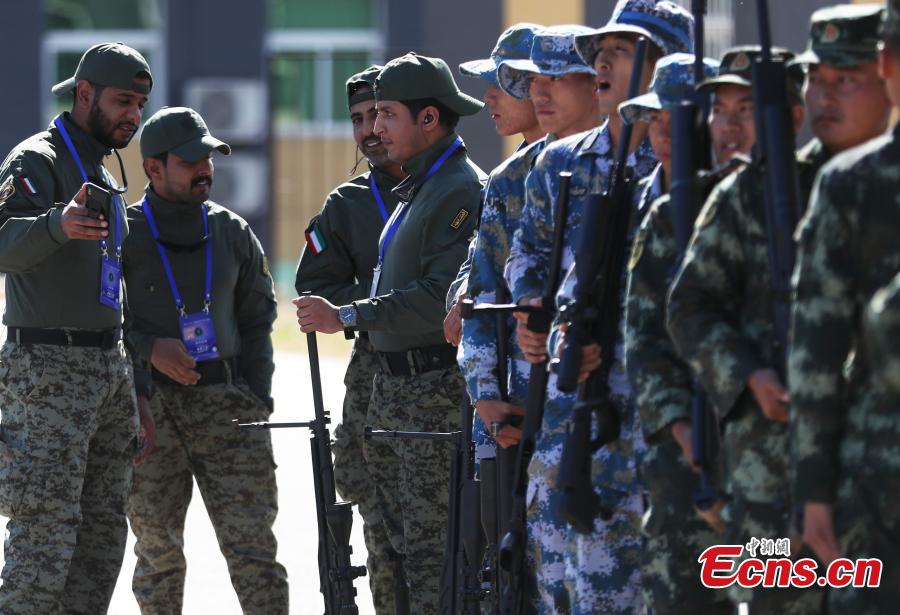 An international sniping competition opens on the outskirts of Beijing on October 18, 2018. Hosted by Chinese armed police forces, the competition invited contestants from member states of the Shanghai Cooperation Organization (SCO) and countries along the Belt and Road. The competition consists of 12 major events including close-range sniping, hostage rescue and comprehensive combat. This is the second such competition hosted by Chinese armed police forces. The first was held in 2016. (Photo: China News Service/ Song Jihe)