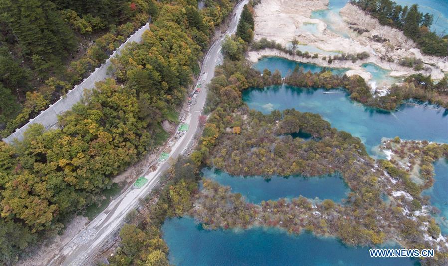 Aerial photo taken on Oct. 18, 2018 shows renovated infrastructures at the Jiuzhaigou Valley Scenic Area in Jiuzhaigou County, southwest China\'s Sichuan Province. The magnitude-7.0 earthquake that hit here on Aug. 8, 2017 and the flooding of this summer caused damages of various degrees to the Jiuzhaigou Valley Scenic Area, which has been temporarily closed since July for renovation. (Xinhua/Jiang Hongjing)