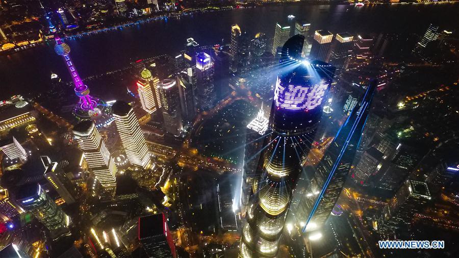 Aerial photo taken on Oct. 17, 2018 shows the night view of Shanghai, east China. The first China International Import Expo (CIIE) is to be held in Shanghai from Nov. 5 to Nov. 10. (Xinhua/Ding Ting)