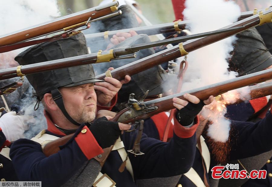 Troops fight during the reconstruction of the Battle of the Nations at the 205th anniversary near Leipzig, Germany, Oct. 20, 2018. The Battle of Leipzig or Battle of the Nations, on 16?19 October 1813, was fought by the coalition armies of Russia, Prussia, Austria and Sweden against the French army of Napoleon. The battle decided that Napoleon had to retreat to France, the beginning of his downfall. (Photo/Agencies)