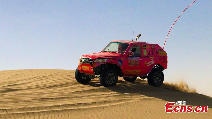 <?php echo strip_tags(addslashes(A Jeep off-road race in Qiemo County, Northwest China’s Xinjiang Uygur Autonomous Region, Oct. 21, 2018. Nearly 100 drivers took part in the three-day competition, including a triangular racecourse that passed through the Taklimakan desert. (Photo: China News Service/Wang Xiaojun))) ?>