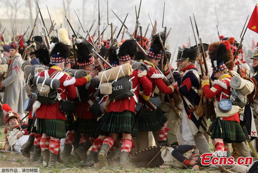 Troops fight during the reconstruction of the Battle of the Nations at the 205th anniversary near Leipzig, Germany, Oct. 20, 2018. The Battle of Leipzig or Battle of the Nations, on 16?19 October 1813, was fought by the coalition armies of Russia, Prussia, Austria and Sweden against the French army of Napoleon. The battle decided that Napoleon had to retreat to France, the beginning of his downfall. (Photo/Agencies)