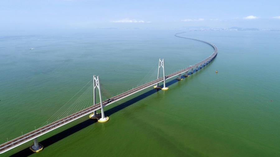 The Hong Kong-Zhuhai-Macao Bridge. (Photo/Xinhua)

3. What\'s the toll charge?

The HZMB Authority will be in charge of the bridge toll. The toll will be in yuan. There\'s only one toll plaza with 20 toll gates, which is located near the Macao and Zhuhai ports on the mainland side. All toll gates will be available for auto-toll systems in Hong Kong and Guangdong province. Besides cash, bank cards and e-payment such as WeChat Pay and Alipay will be available.