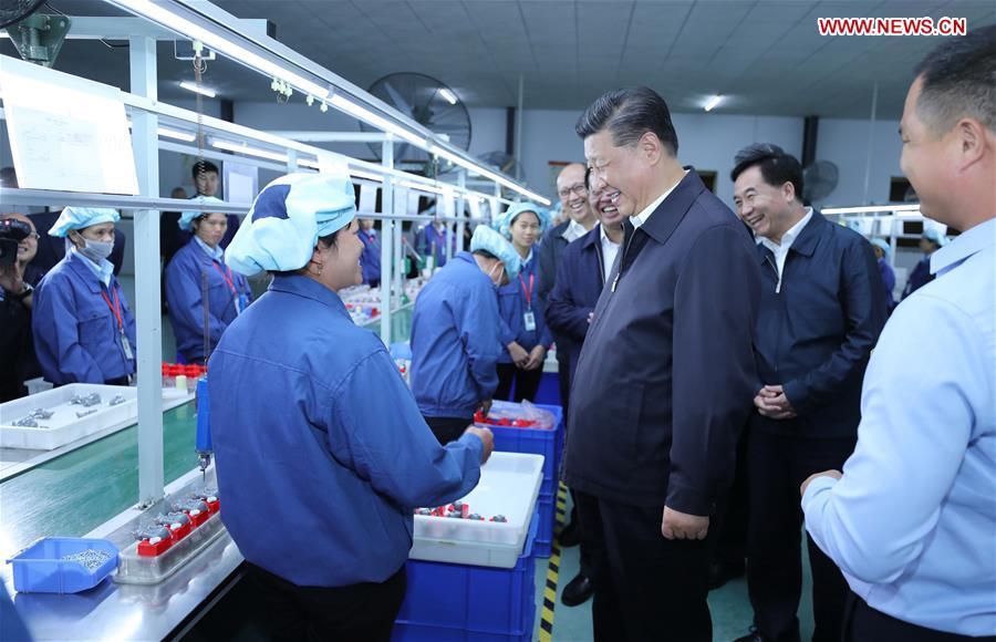 <?php echo strip_tags(addslashes(Chinese President Xi Jinping, also general secretary of the Communist Party of China Central Committee and chairman of the Central Military Commission, visits a toy factory in Lianzhang Village, Lianjiangkou Township, Yingde of Qingyuan City, south China's Guangdong Province, during an inspection tour, Oct. 23, 2018. (Xinhua/Ju Peng))) ?>