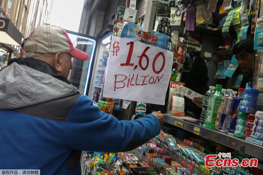 <?php echo strip_tags(addslashes(A man buys tickets for Tuesday's Mega Millions lottery drawing after the jackpot exceeded $1.6 billion in New York City, New York, U.S., Oct. 23, 2018. (Photo/Agencies))) ?>