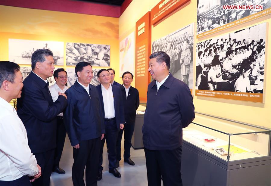 Chinese President Xi Jinping, also general secretary of the Communist Party of China Central Committee and chairman of the Central Military Commission, visits an exhibition on Guangdong\'s development during the past 40 years since the reform and opening up at a museum in Shenzhen, south China\'s Guangdong Province, during an inspection tour, Oct. 24, 2018. (Xinhua/Xie Huanchi)