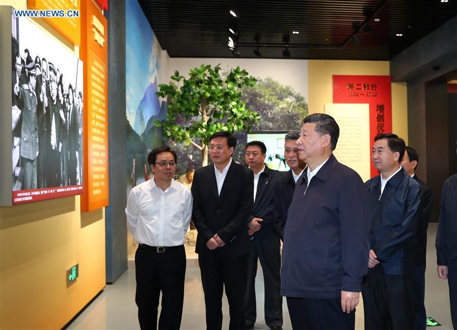 Chinese President Xi Jinping, also general secretary of the Communist Party of China Central Committee and chairman of the Central Military Commission, visits an exhibition on Guangdong\'s development during the past 40 years since the reform and opening up in Shenzhen, south China\'s Guangdong Province, during an inspection tour, Oct. 24, 2018. (Xinhua/Xie Huanchi)