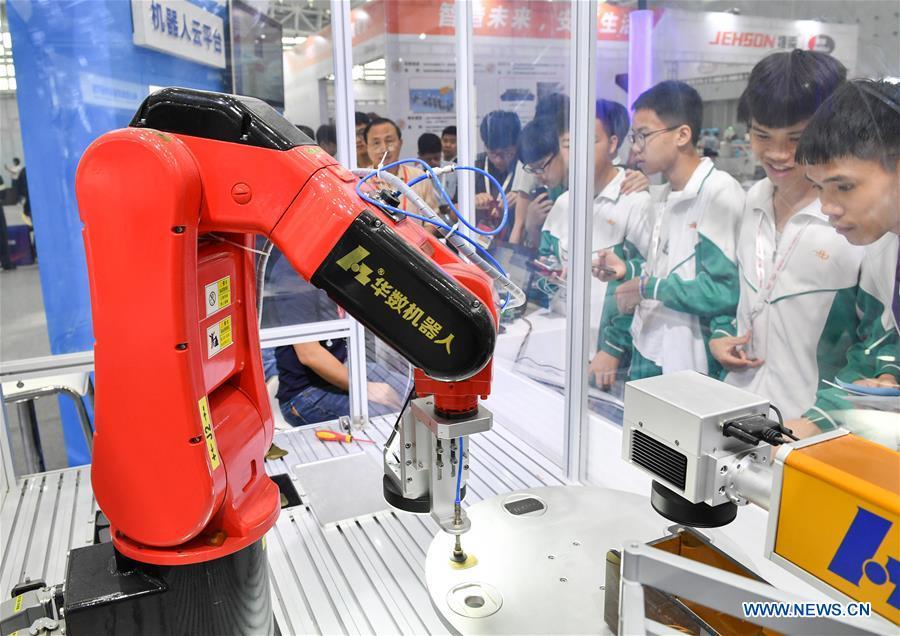 A robot is displayed at the Internet Plus Expo in Shunde District of Foshan, south China\'s Guangdong Province, Oct. 25, 2018. Themed with \