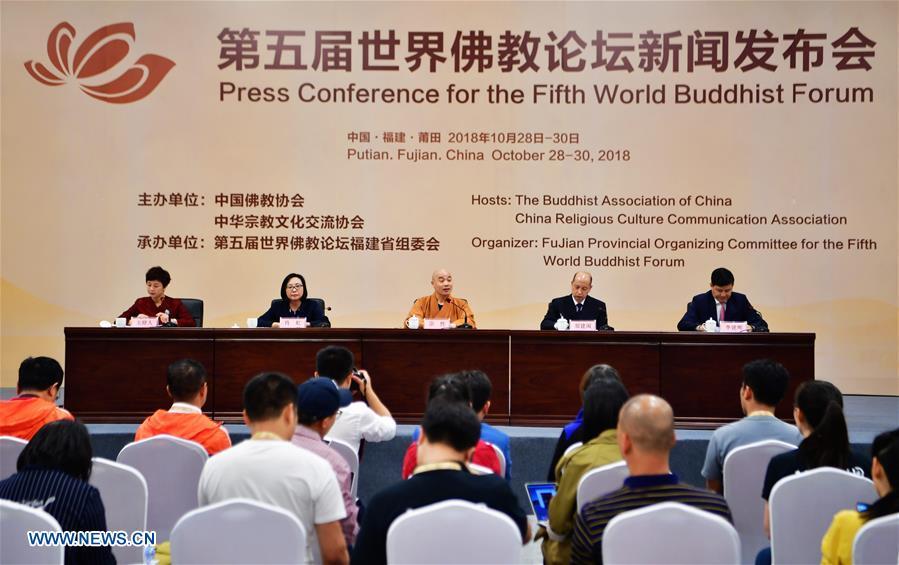 <?php echo strip_tags(addslashes(Zong Xing (3rd L), Vice President of the Buddhist Association of China, answers questions at a press conference for the fifth World Buddhist Forum in Putian, southeast China's Fujian Province, Oct. 28, 2018. A record number of over 1,000 Buddhists, scholars and representatives from 55 countries and regions attended the fifth World Buddhist Forum, which will last until Oct. 30.(Xinhua/Wei Peiquan))) ?>