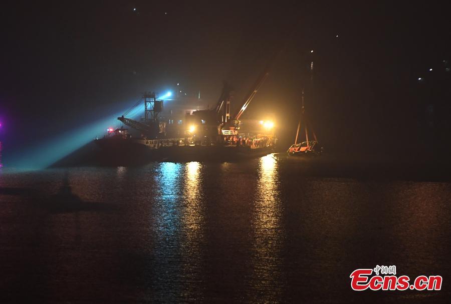 <?php echo strip_tags(addslashes(Rescuers on Wednesday night salvaged the wreck of a bus that plunged into the Yangtze River in Chongqing Municipality leaving at least nine people dead. The bus was pulled out of water by a floating crane at about 11:30 p.m.. Rescuers are expected to enter the bus to search for bodies of victims. The bus veered onto the wrong side of the road and collided into an oncoming car before breaking through road fencing and falling off a bridge in Chongqing's Wanzhou District on Sunday.(Photo: China News Service/ Chen Chao))) ?>