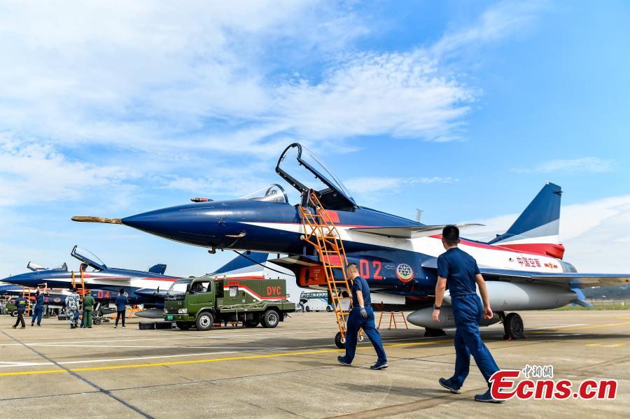 Fighter jets of the Chinese People\'s Liberation Army (PLA) Air Force\'s August 1st aerobatics team is seen at an airport in Zhuhai, South China’s Guangdong province, October 31, 2018. The team will perform at the 12th China International Aviation and Aerospace Exhibition (Airshow China). The event will be held in Zhuhai from Nov. 6 to 11. (Photo: China News Service/ Chen Jimin)