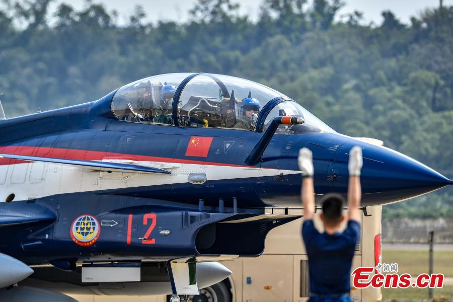 A fighter jet of the Chinese People\'s Liberation Army (PLA) Air Force\'s August 1st aerobatics team is seen at an airport in Zhuhai, South China’s Guangdong province, October 31, 2018. The team will perform at the 12th China International Aviation and Aerospace Exhibition (Airshow China). The event will be held in Zhuhai from Nov. 6 to 11. (Photo: China News Service/ Chen Jimin)