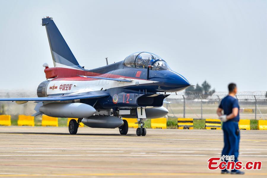 A fighter jet of the Chinese People\'s Liberation Army (PLA) Air Force\'s August 1st aerobatics team is seen at an airport in Zhuhai, South China’s Guangdong province, October 31, 2018. The team will perform at the 12th China International Aviation and Aerospace Exhibition (Airshow China). The event will be held in Zhuhai from Nov. 6 to 11. (Photo: China News Service/ Chen Jimin)